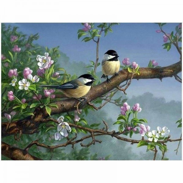 Zingende vogels op bloementak