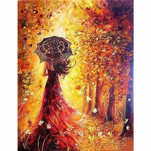 Vrouw in een herfst bos