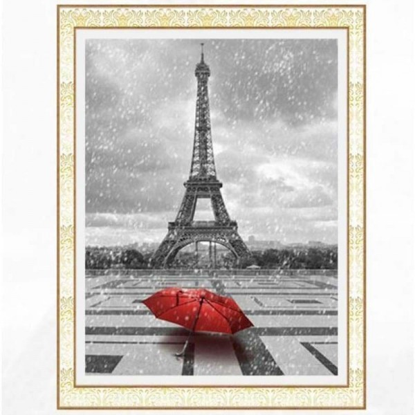 Rode paraplu bij de Eiffeltoren